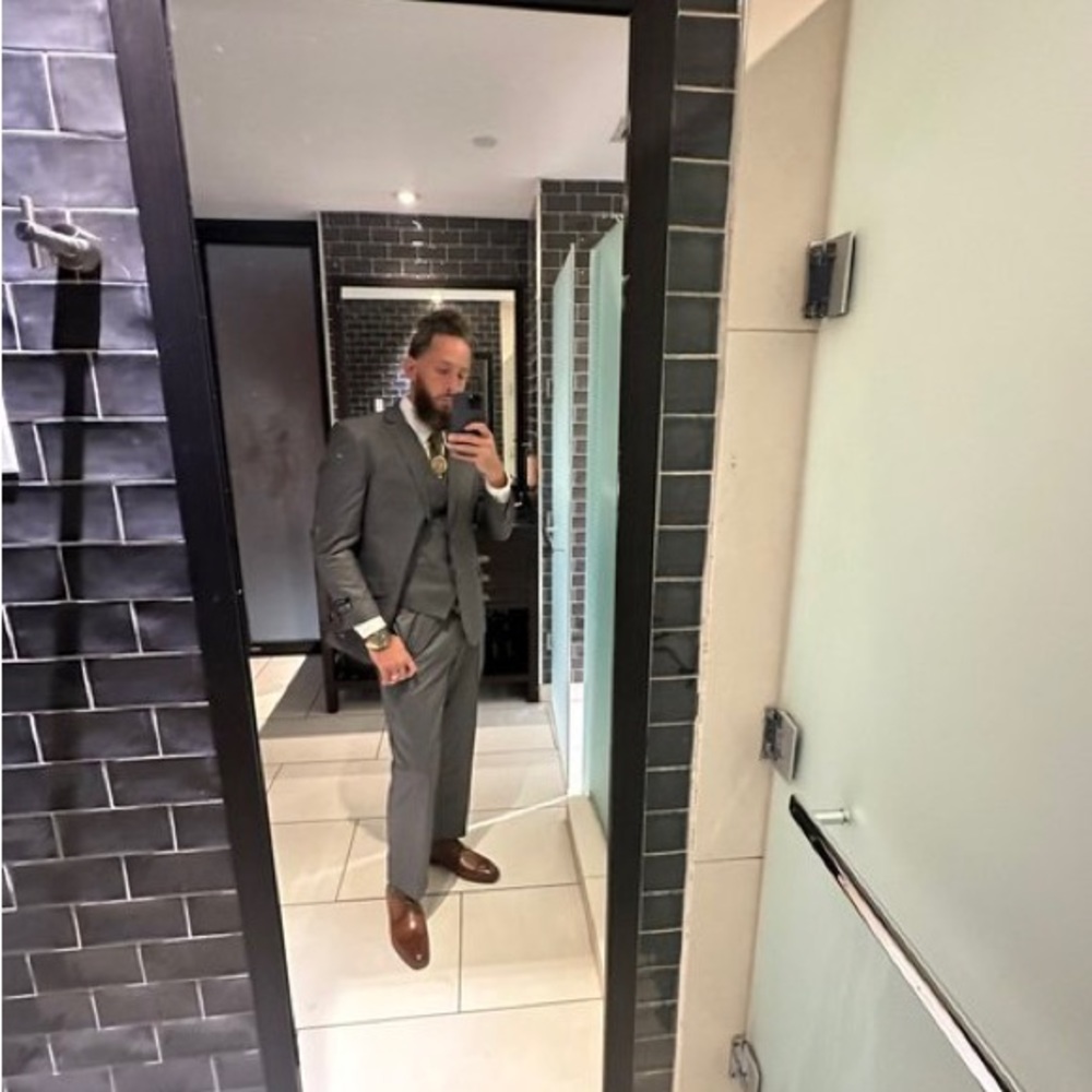 Grey 3 piece suit.